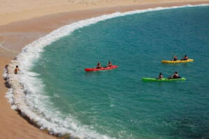 Los Cabos: Kayaking and Snorkeling in Two Pristine Bays - Kayaking the huge granite walls toward Santa Maria Bay