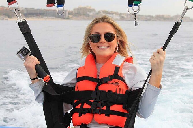 Los Cabos: Parasailing Adventure at Medano Beach - Getting to the main boat: Medano Beach setup and sea taxi reality
