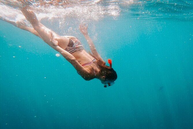 Luxury Snorkeling Tour in Cabo San Lucas - Sea of Cortez sailing near Medano Beach, with snacks and drinks