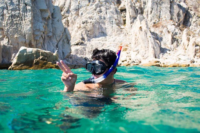 Private Los Cabos Arch and Playa del Amor Tour by Glass Bottom Kayak - The Pelican Rock segment: warm water, easy snorkel start